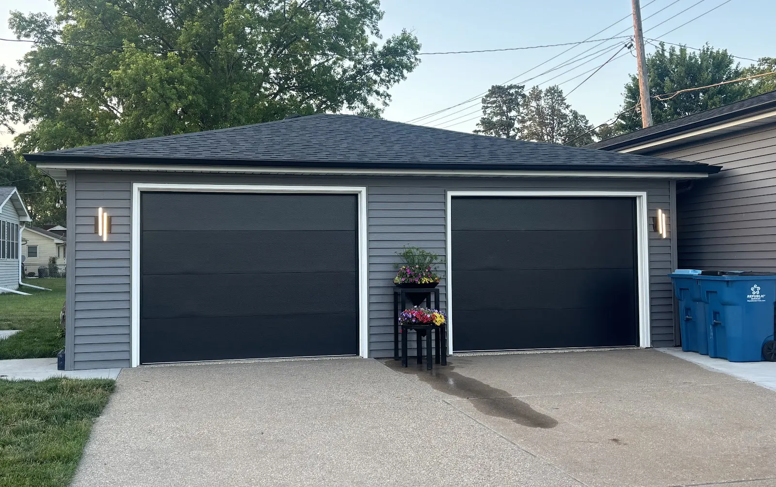 Detached garage with a new roof and siding